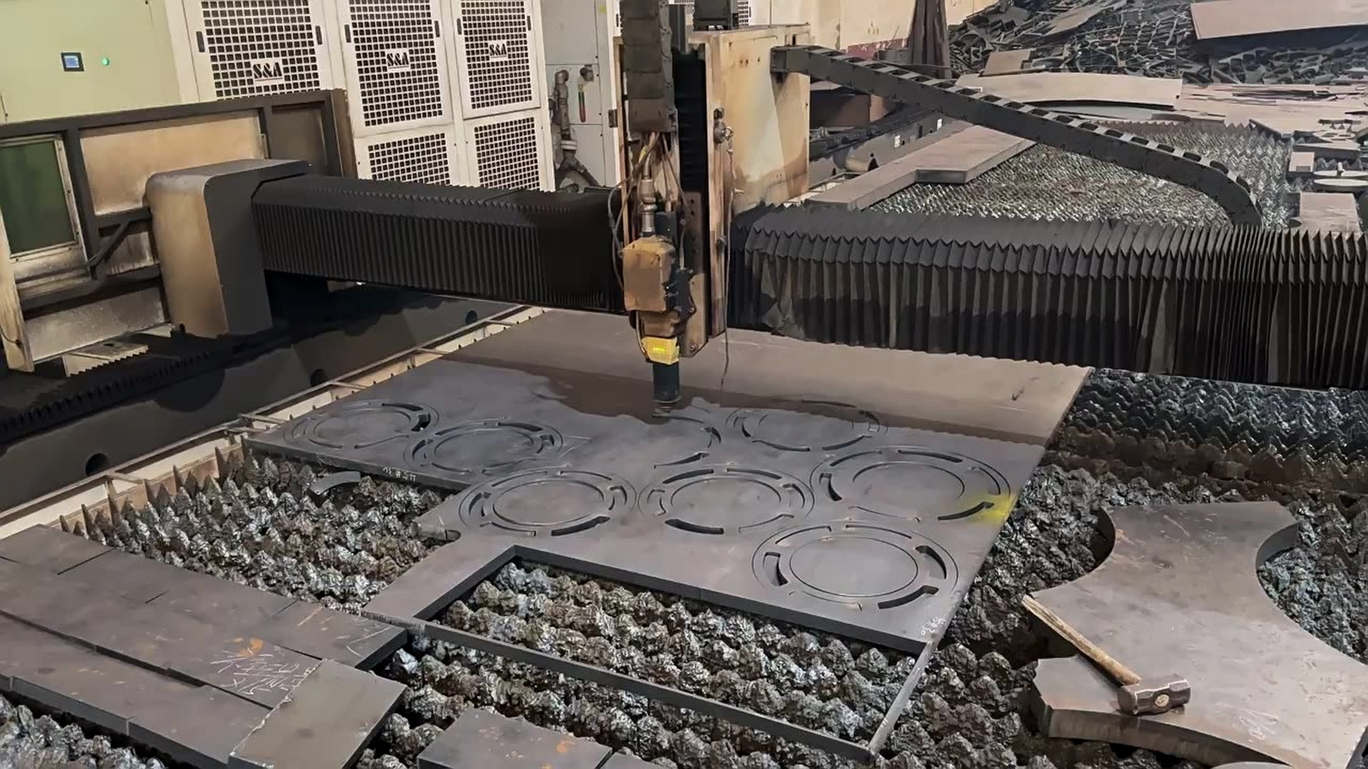 Large industrial steel workshop with plate stock