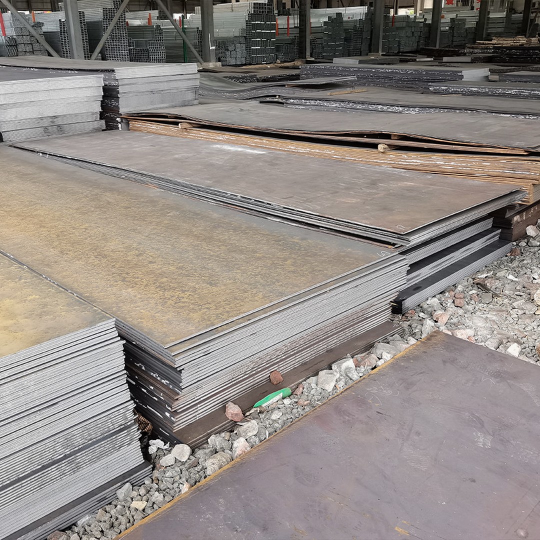 Stacked steel plates in an industrial workshop